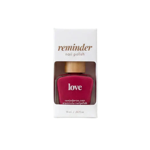 Reminder Nail Polish in Love Watermelon Red in package on white background