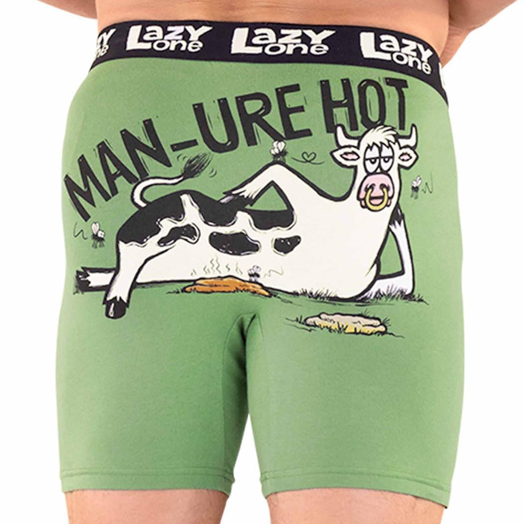 Green underwear with a cow graphic and text, brand 'Lazy One' visible