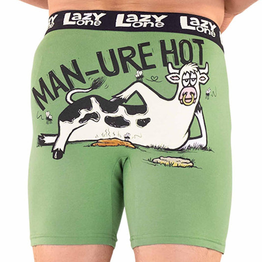 Green underwear with a cow graphic and text, brand 'Lazy One' visible