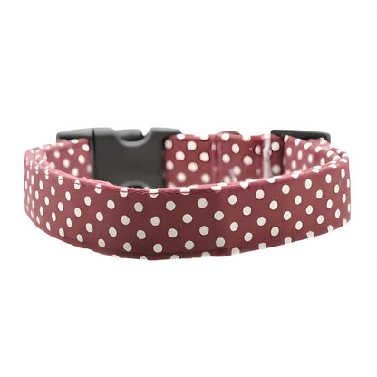 Dog collar with white polka dots on a red background