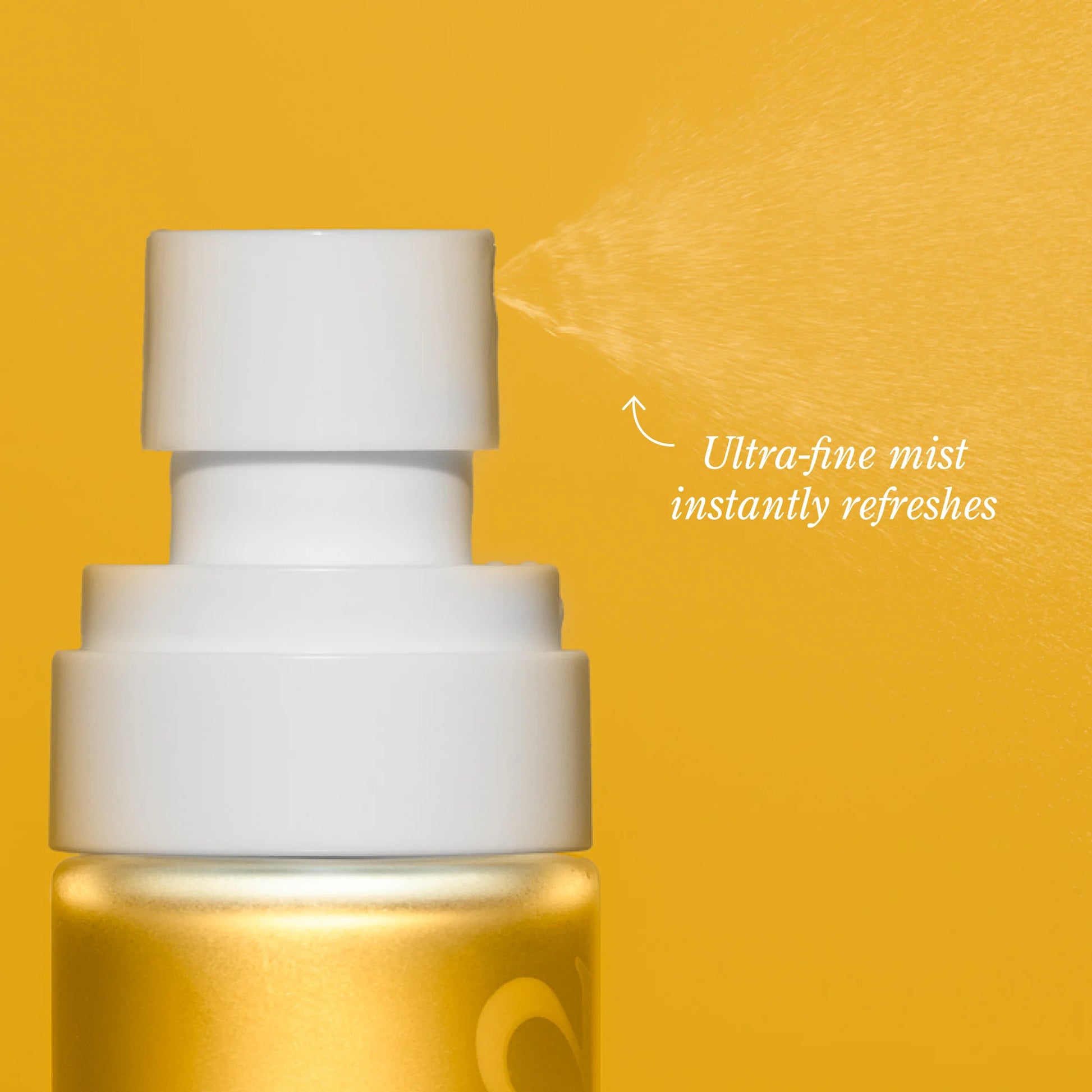 White spray bottle on a yellow background with text 'Ultra-fine mist instantly refreshes'.