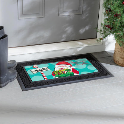 Christmas-themed doormat with Santa Claus design on a white floor in front of a door.
