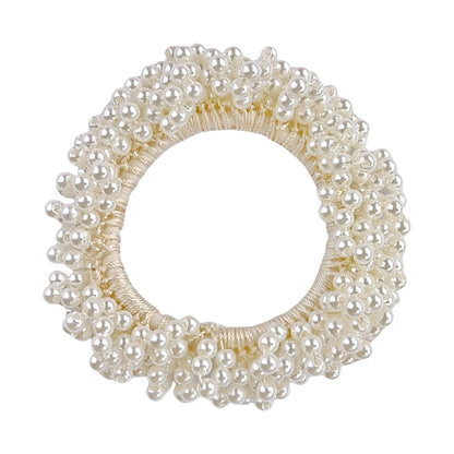 Pearl hair scrunchie on a white background
