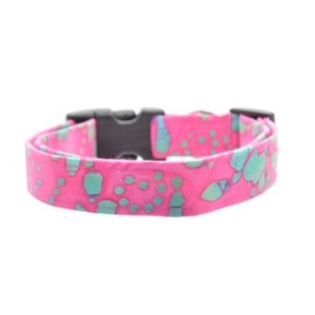 Pink dog collar with blue and gray pattern on a white background