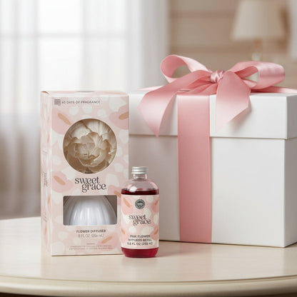 Sweet Grace Flower Diffuser and Refill Oil shown together with a gift box 