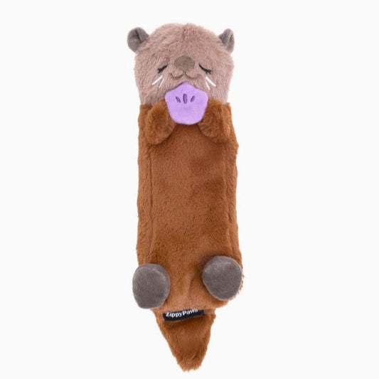 Plush toy otter on a white background