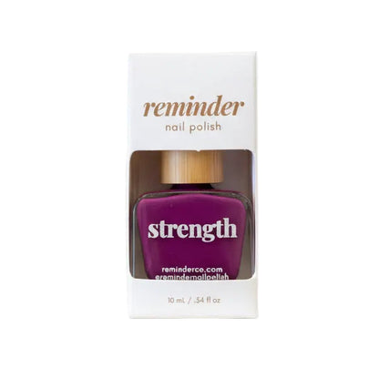 Reminder Nail Polish in Strength Violet Purple in package on a white background.