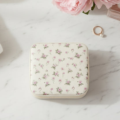 Floral-patterned jewelry box on counter